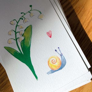 Carte postale - Muguet - illustration aquarelle  1er Mai - Printemps - escargot