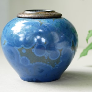 Cat urns, small urns for human ashes, dog urns, cremation urns, crystalline pottery, decorative urns, keepsake urns, memorial urns.