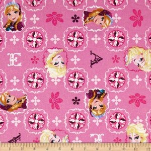 May include: Pink fabric with a repeating pattern of white and pink floral designs and images of princesses from the movie Frozen. The fabric has a glittery texture.
