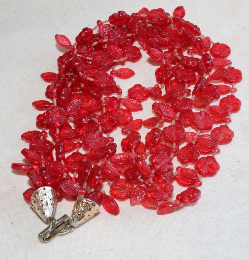 Vintage Three Strand Red Plastic Leaf And Flower Necklace