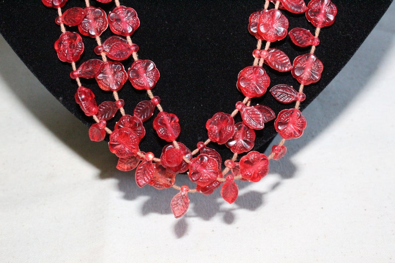 Vintage Three Strand Red Plastic Leaf And Flower Necklace