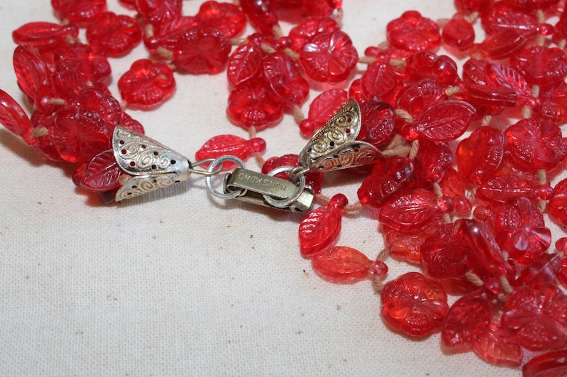 Vintage Three Strand Red Plastic Leaf And Flower Necklace