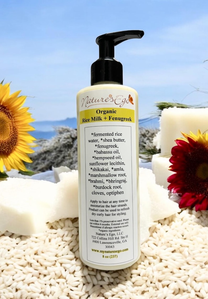 May include: A white bottle with a black pump dispenser labeled "Nature's Ego Organic Rice Milk + Fenugreek". The bottle lists ingredients including fermented rice water, shea butter, fenugreek, babassu oil, hempseed oil, sunflower lecithin, shikakai, amla, marshmallow root, brahmi, bhringraj, burdock root, cloves, and optiphen. The bottle is 8 oz (237 ml).
