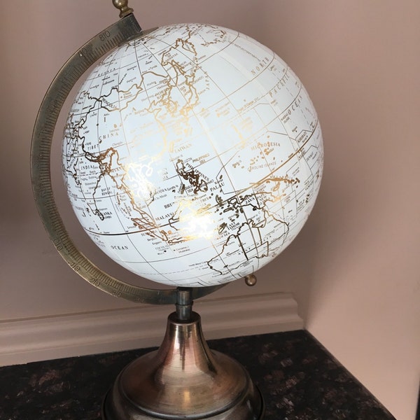 Beautiful gold And white globe with message