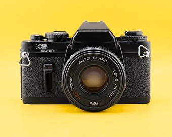 Cámara réflex de película vintage Sears KS Super 35 mm con objetivo automático Sears de 50 mm F2