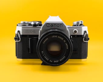 Vintage Canon AE-1 35 mm spiegelreflexcamera met Canon FD 50 mm F1.8-lens