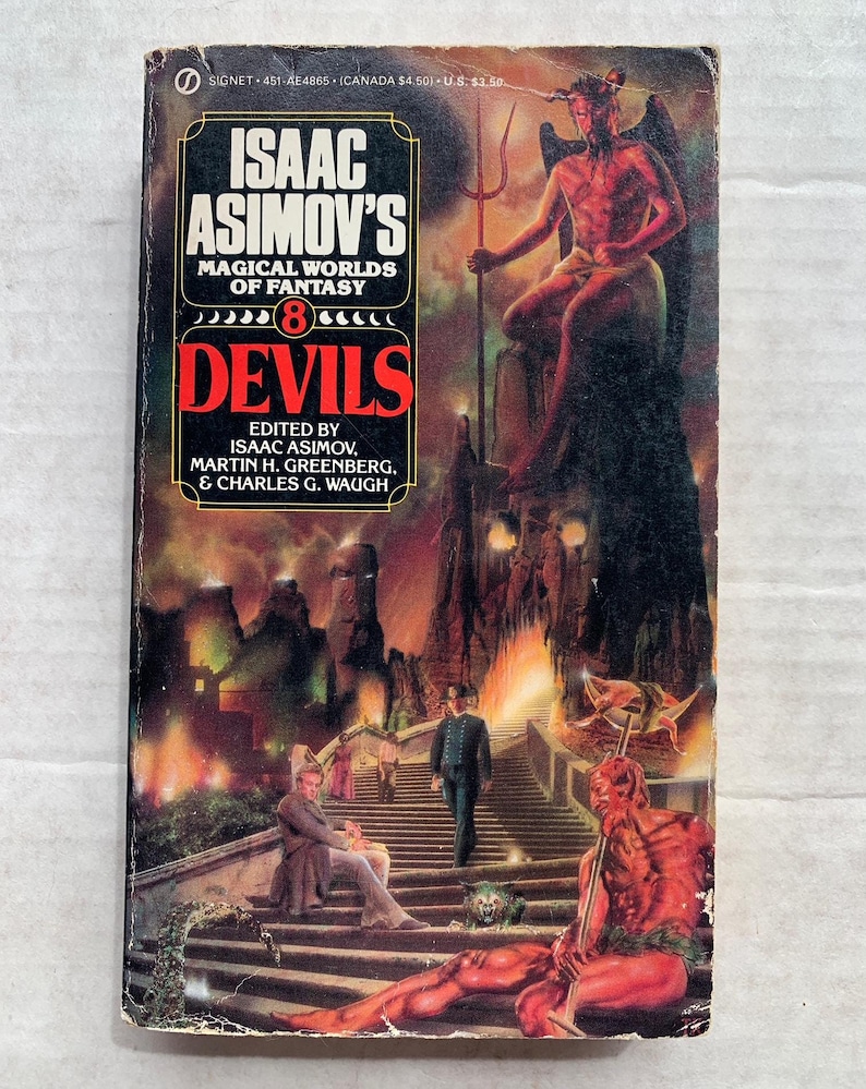 Może przedstawiać: Okładka książki z czerwoną i czarną ilustracją diabła z tr&oacute;jzębem. Tytuł książki to "Isaac Asimov's Magical Worlds of Fantasy 8 Devils".