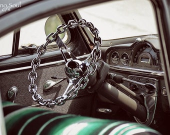 On Lock Chain steering wheel on a vintage 1949 Pontiac Lowrider classic car photo photography Chicano Soul