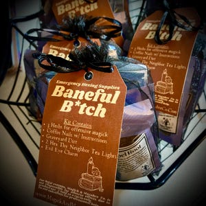 May include: A brown paper bag with a tag that reads "Emergency Hexing Supplies Baneful B*tch" and lists the kit contents: 3 Herbs for offensive magick, Coffin Nails w/ Instructions, Graveyard Dirt, 2 Hex Thy Neighbor Tea Lights, Evil Eye Charm.