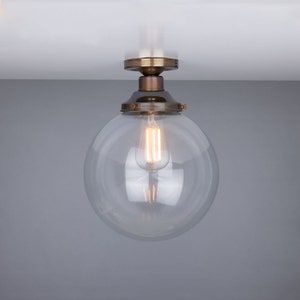 Lampada da soffitto a filo Riad in vetro trasparente a globo, 9,8'' (25 cm)