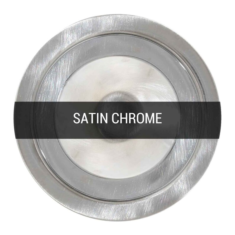 May include: Close-up of a round, satin chrome finish. The finish has a brushed texture. "SATIN CHROME" is written in black text on a black bar.