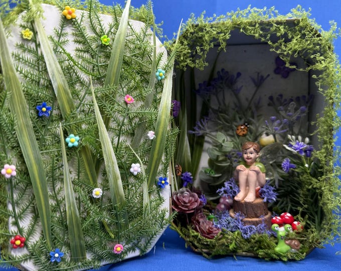 Fairy house in a vintage tin box