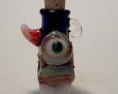 Donut, Cyclopean,monster,potion bottle, pendant with teeth, horn and glow in the dark eye. Wood Cork 1 x 1 1.75