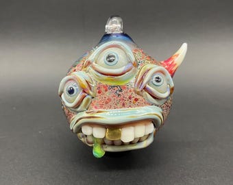 Triclops glass ornament