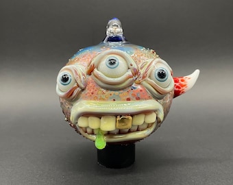 Triclops glass ornament