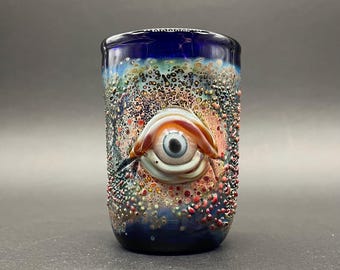 Vaso de chupito individual con forma de ojo que brilla en la oscuridad