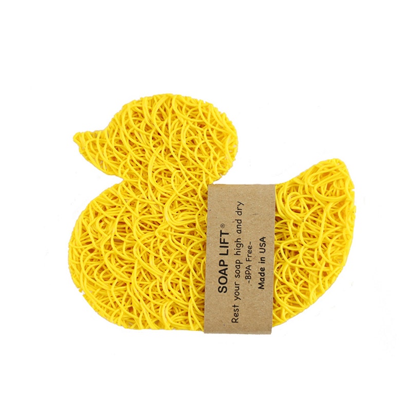 May include: Yellow rubber duck shaped soap saver made of woven fibers. The soap saver has a label that reads "SOAP LIFT Rest your soap high and dry -BPA Free- Made in USA".