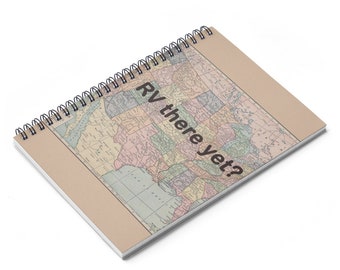 May include: A spiral bound notebook with a vintage map of the United States on the cover. The text "RV there yet?" is printed on the map.