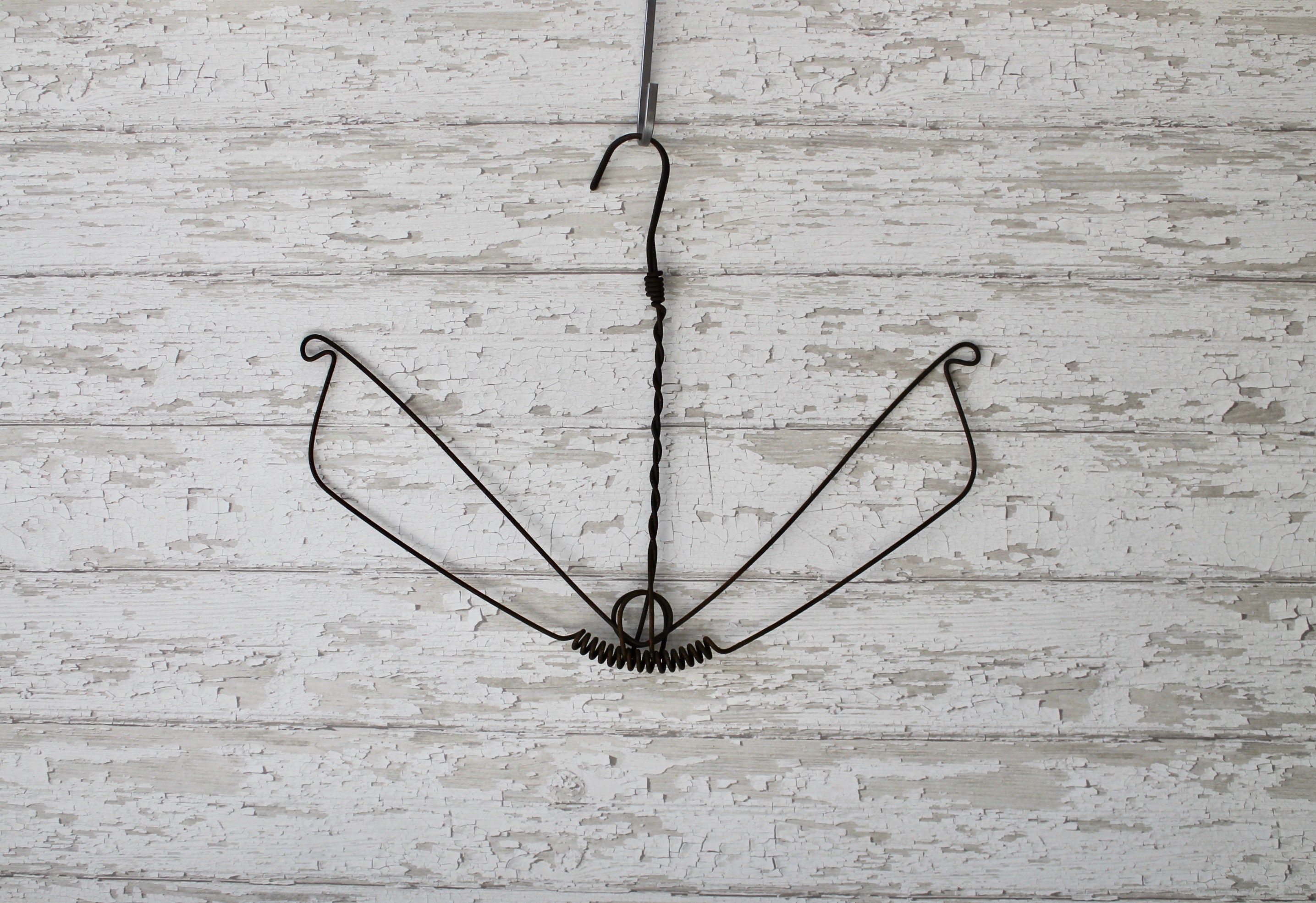 Antique metal clothes hangers hotsell