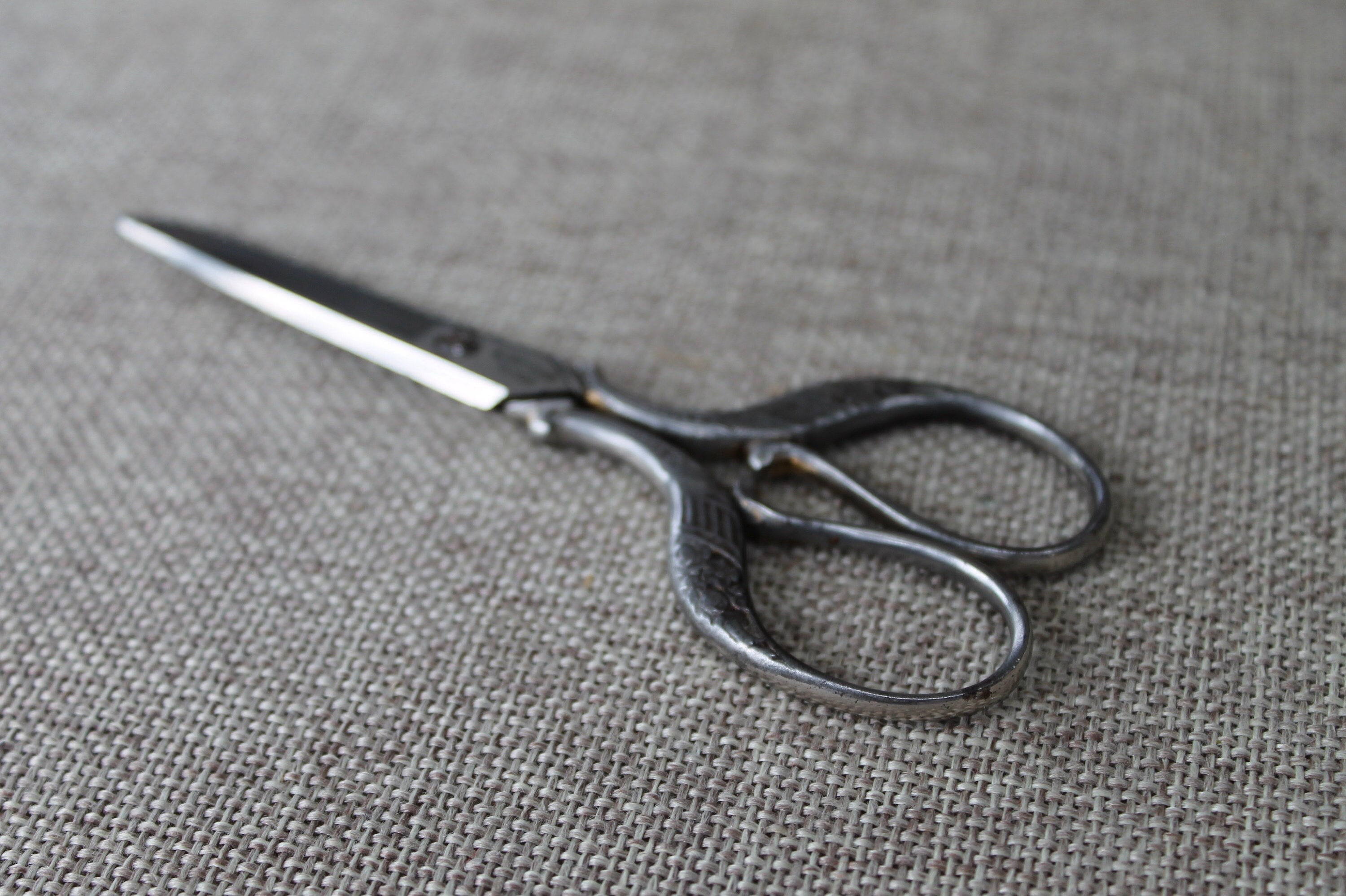 Small Scissors in the Expert Hand of an Adult Stock Photo - Image of  fashion, clothing: 179836740