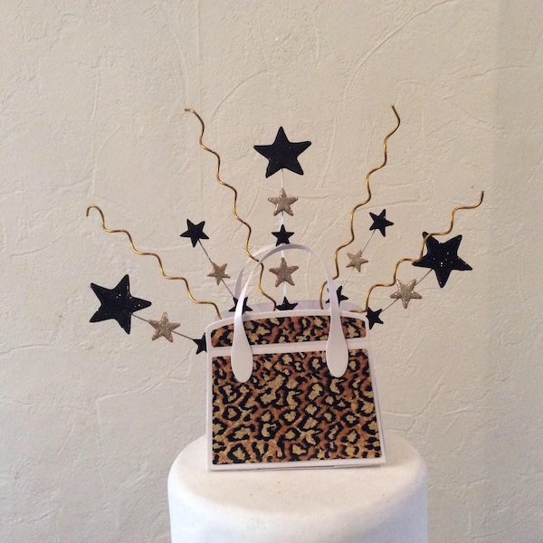 Handbag cake topper with stars and twists