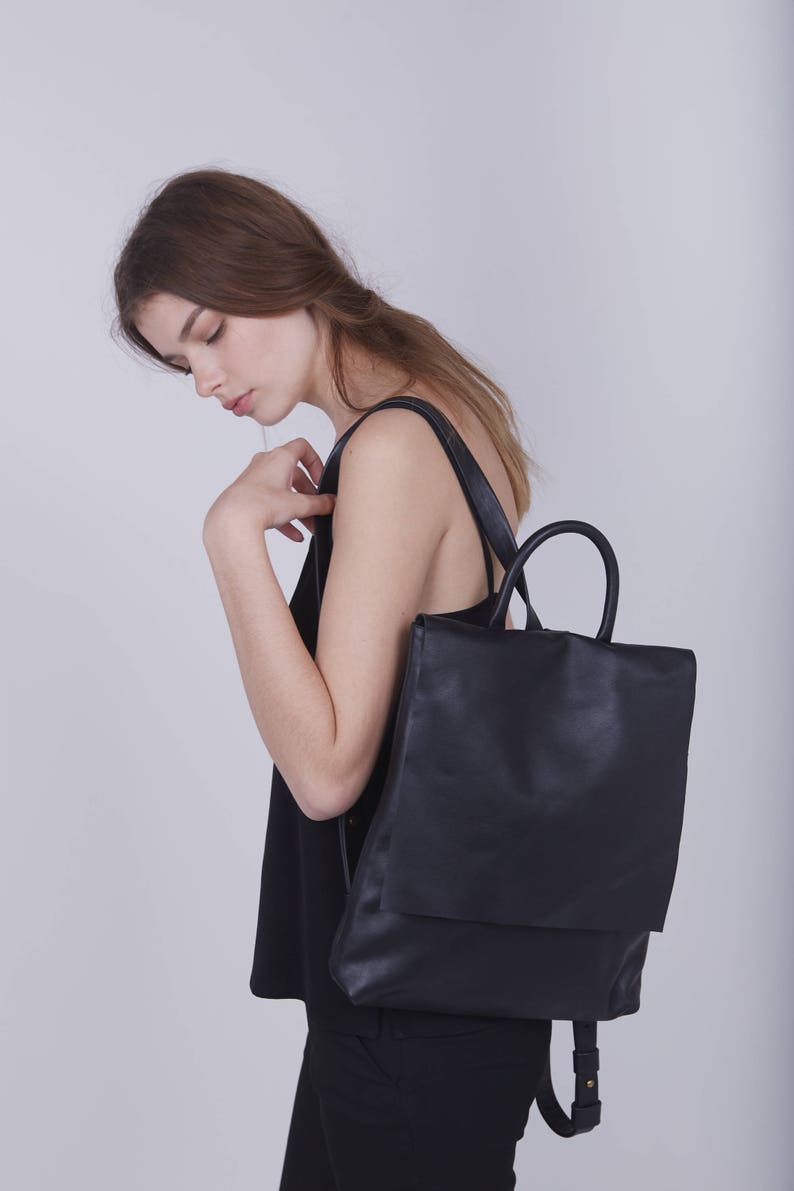 black leather flap backpack