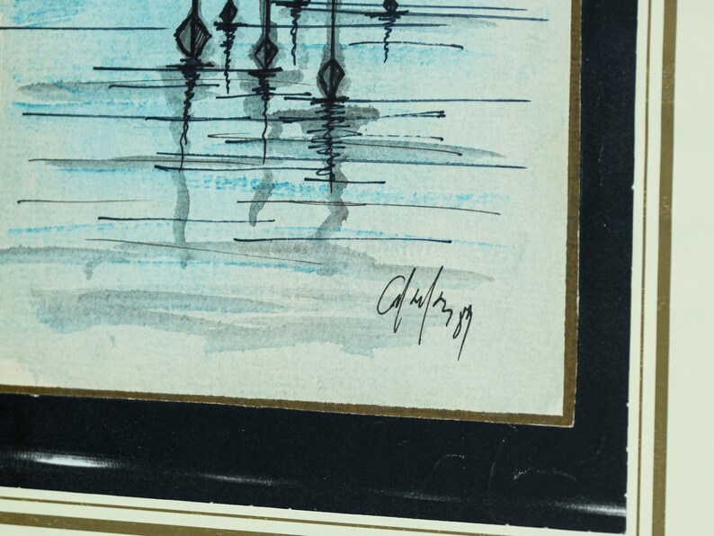 May include: A framed watercolor painting of a blue and white abstract landscape with a black signature in the bottom right corner. The signature reads "C.H. 1989".