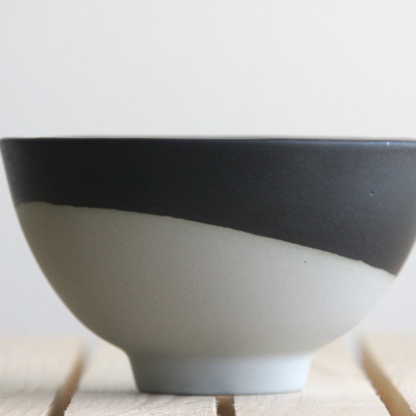 Ceramic bowl in concrete gray with black mat glaze.Great for serving soups and desserts. Urban and modern look.