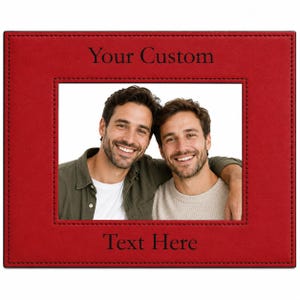 May include: A rectangular red photo frame with black stitched edges. The frame features the black text Your Custom at the top and Text Here at the bottom. Inside the frame is a photograph of two smiling individuals with dark hair and beards.