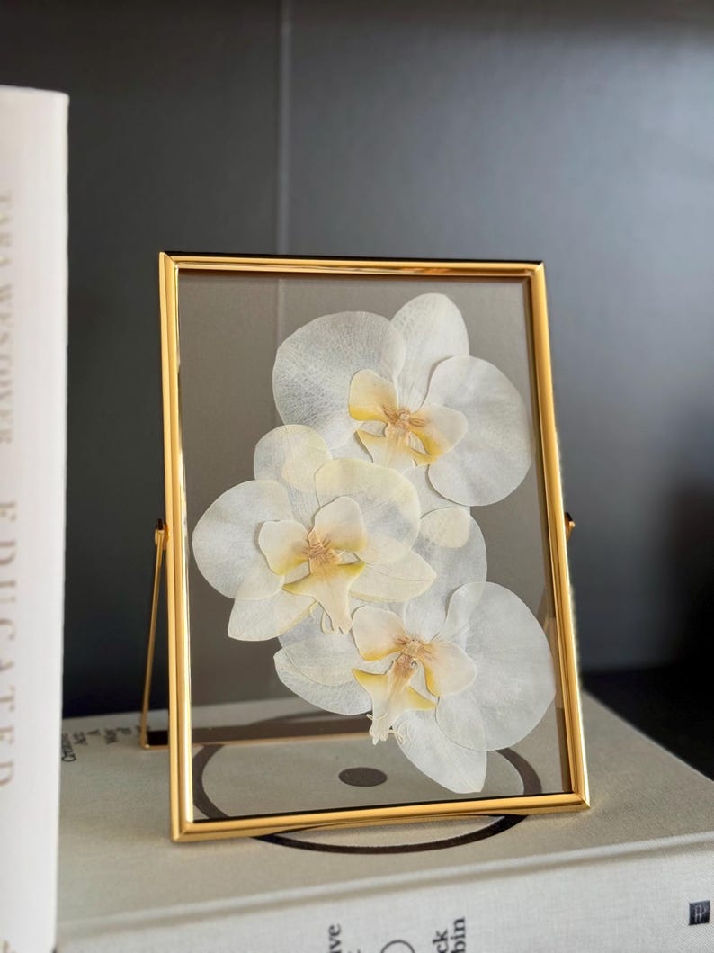 Pressed floral art, white orchids, wedding flowers, Chelsey Walker Creative, 2025