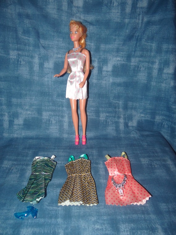 Great Gift Items: Brand New Barbie Clothes and Accessories.. the Barbie  That is Modeling the Clothes is NOT for Sale..8 Pieces 