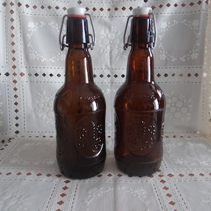 Four Vintage Grolsch Dark Amber Bottles Available.... price and shipping are for ONE...Please read description for more details
