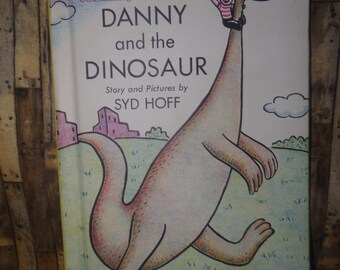 New York Times Outstanding Book of the Year.. Children's book, " Danny and the Dinosaur" by Syd Hoff.. I can read books