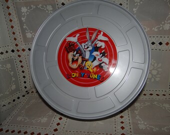 Awesome Vintage Looney Tunes Tin Resembles an Old Time Film Roll Tin...Please read description carefully and look at all pics