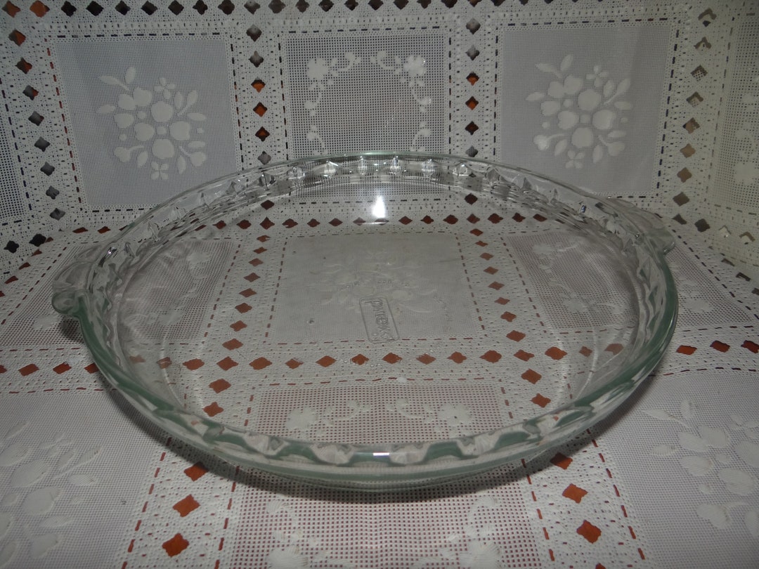 Two Vintage Pyrex Glass Pie Plates Available.. Price and Shipping Are