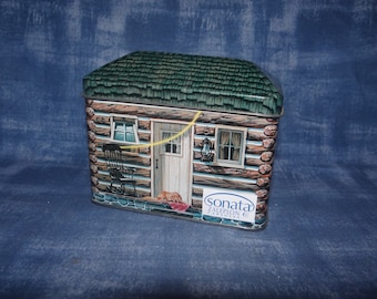 Vintage 2001 Tin Advertising Sonata Capsules.. Log Cabin Design