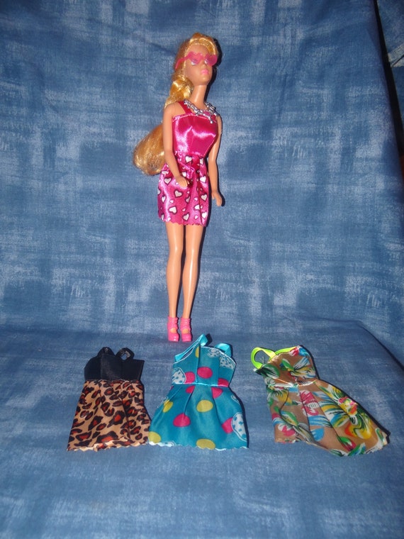 Great Gift Items: Brand New Barbie Clothes and Accessories.. the Barbie  That is Modeling the Clothes is NOT for Sale..7 Pieces 