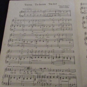 May include: Sheet music for the song "Tarra Ta-larra Ta-lar" by Marty Symes and Johnny Farrow. The music is written in a standard musical notation format with lyrics printed below the notes. The song is a lullaby.