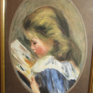 May include: A framed oil painting of a young girl with blonde hair wearing a blue dress and white collar, reading a book.