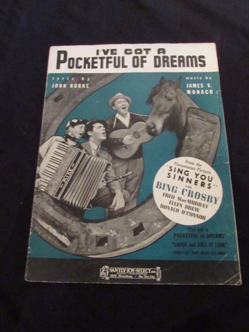 May include: A vintage sheet music cover for the song "I've Got a Pocketful of Dreams" from the Paramount Picture "Sing You Sinners" starring Bing Crosby, Fred MacMurray, Ellen Drew, and Donald O'Connor. The cover features a black and white photo of the cast singing and playing musical instruments.