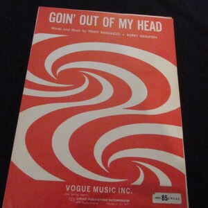 May include: A red and white sheet music cover with a swirling design. The title is "Goin' Out of My Head" with the words and music credited to Teddy Randazzo and Bobby Weinstein. The cover also includes the name "Vogue Music Inc." and the price of 85 cents.