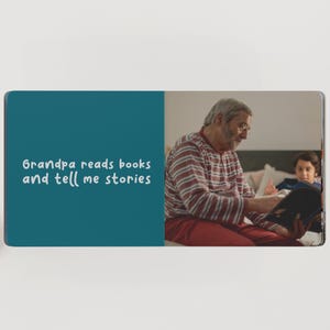 May include: A rectangular teal background with the text "Grandpa reads books and tell me stories." On the right, a person in a red and white striped shirt reads a book to a child.
