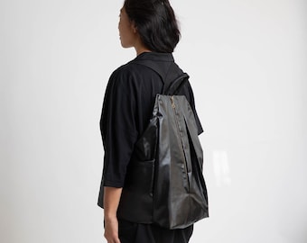 Zaino convertibile in tela nera: zaino vegano per bici