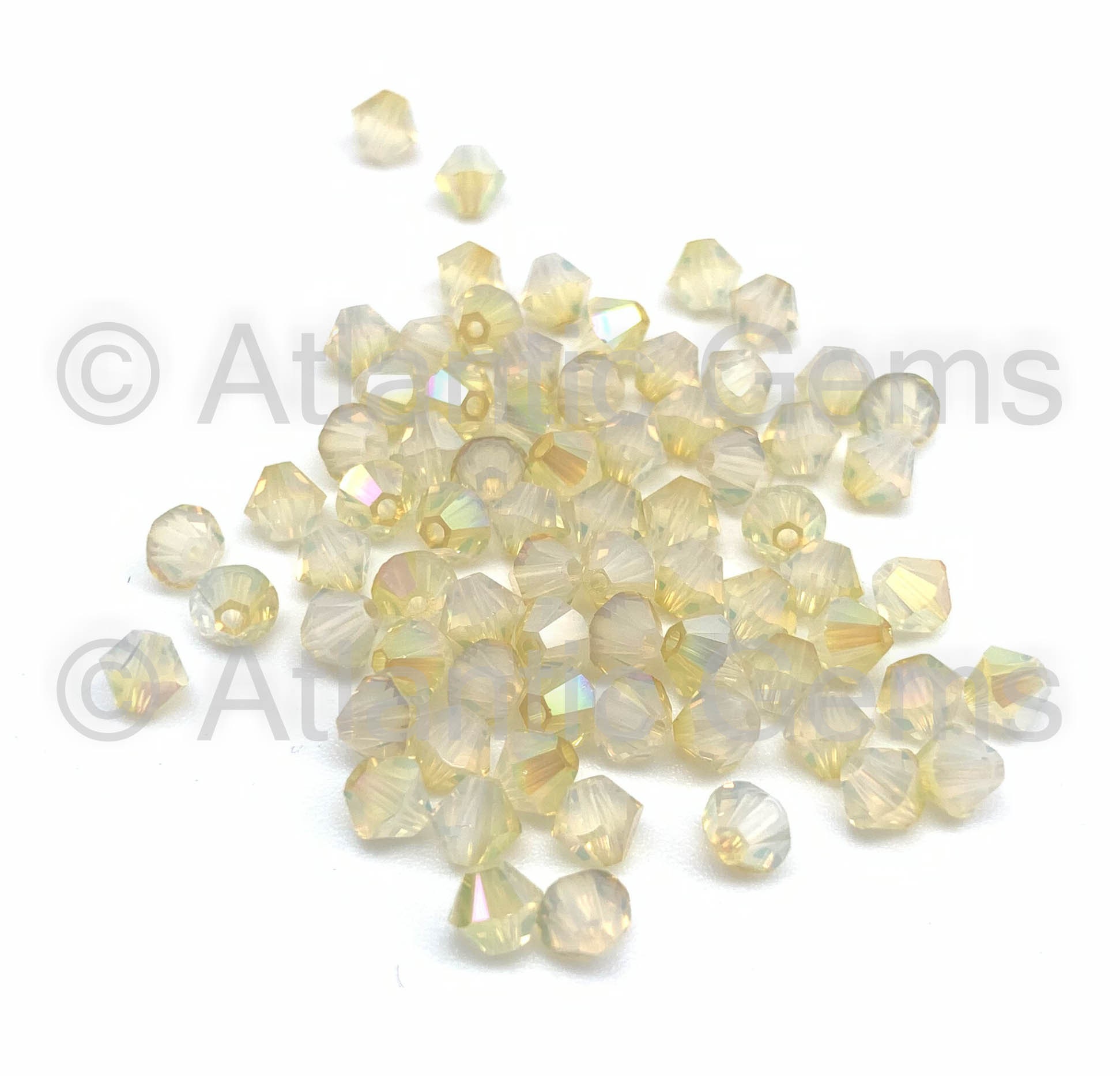 アミパリス ブローチ White Opal Lemon Coated AMC 6mm Swarovski 5328 Bicone