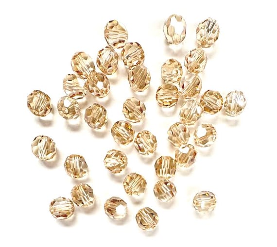 【Swarovski】スワロフスキー ゴールドシャドウクリスタル5064260 クリスタル ゴールデンシャドウ 8 mm スワロフスキー 5000 ラウンド
