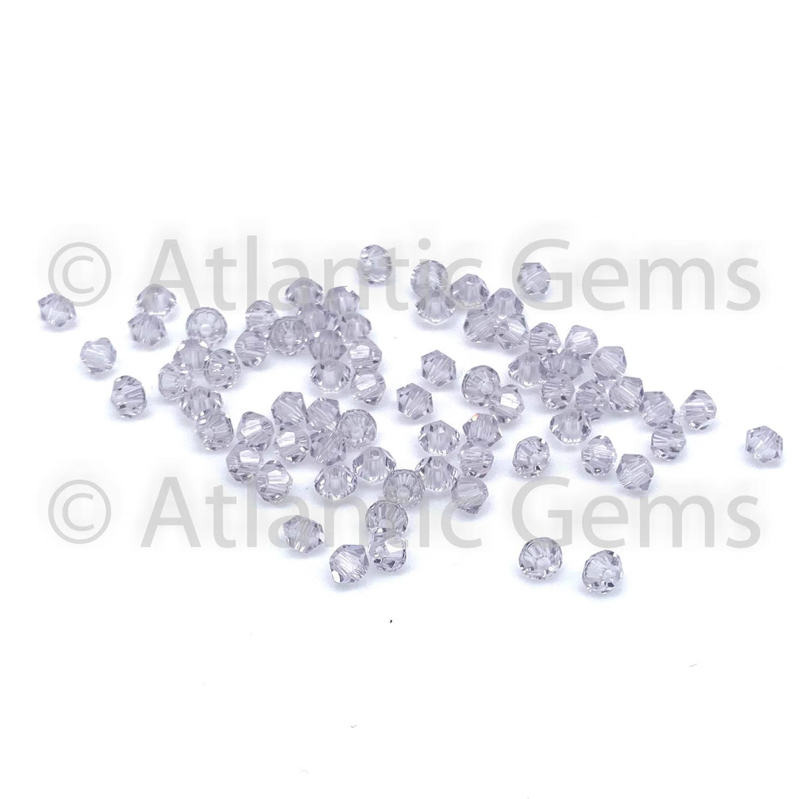 スモーキーモーブ 4 mm スワロフスキー 5328 バイコーン - 72 個