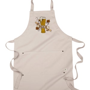 May include: A beige cotton apron with a large pocket and adjustable straps. The apron features a graphic of a beer glass with the word "Beer" on a banner.