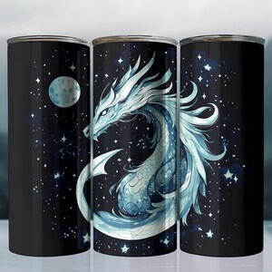 May include: A black tumbler featuring a detailed illustration of a blue and white dragon against a starry night sky with a moon. The dragon has intricate scales and flowing features. The tumbler has a sleek, cylindrical shape.