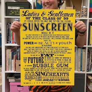 May include: A yellow poster with black text that reads "Ladies & Gentlemen of the Class of 99" and "Sunscreen would be it". The poster also includes advice for young people, such as "Enjoy the power and beauty of youth", "Do not worry about the future", "Sing! Be heartless", and "The race is long and in the end it is only with yourself".