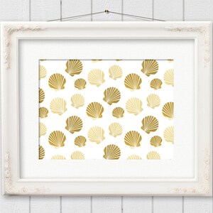May include: A white picture frame with a gold seashell pattern on a white background. The seashells are in a repeating pattern.